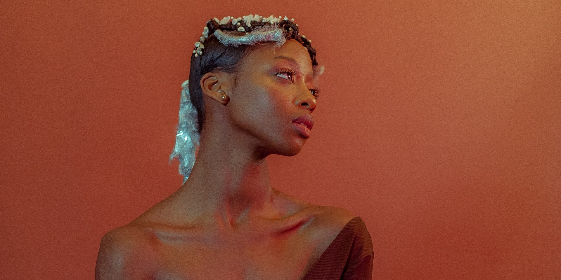 Shooting Black Models with Warm Light