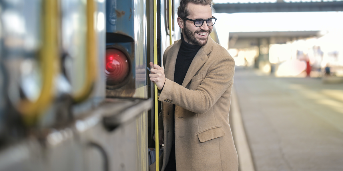 Image commercially licensed from: https://unsplash.com/photos/man-in-beige-coat-standing-beside-train-qNAFGAoP3cI
