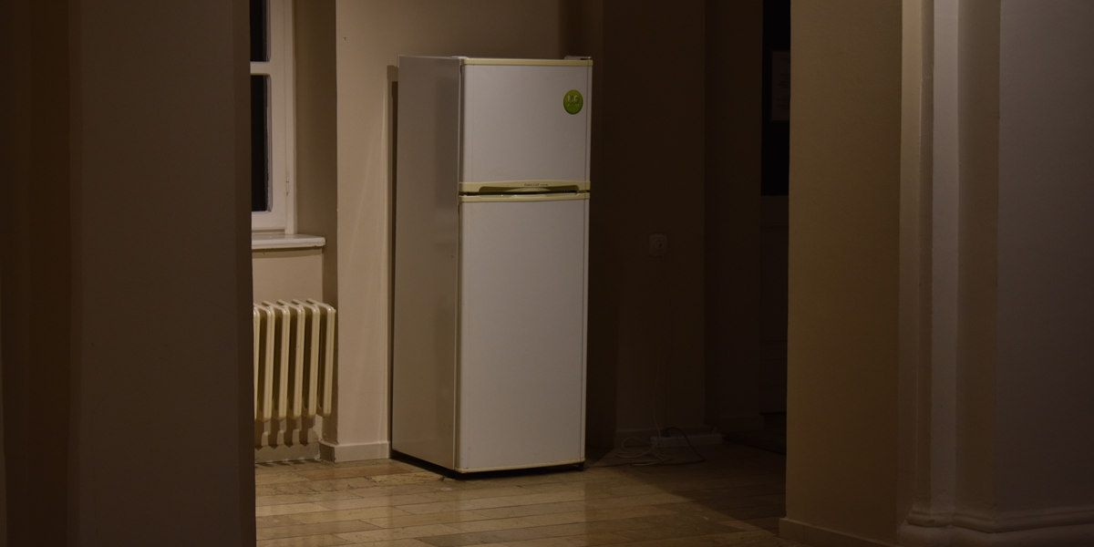 Image commercially licensed from: https://unsplash.com/photos/a-white-refrigerator-freezer-sitting-inside-of-a-kitchen-ZohaOI57nxU